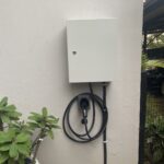 Wall-mounted EV charge point installed by PlugPoint EV Abuja