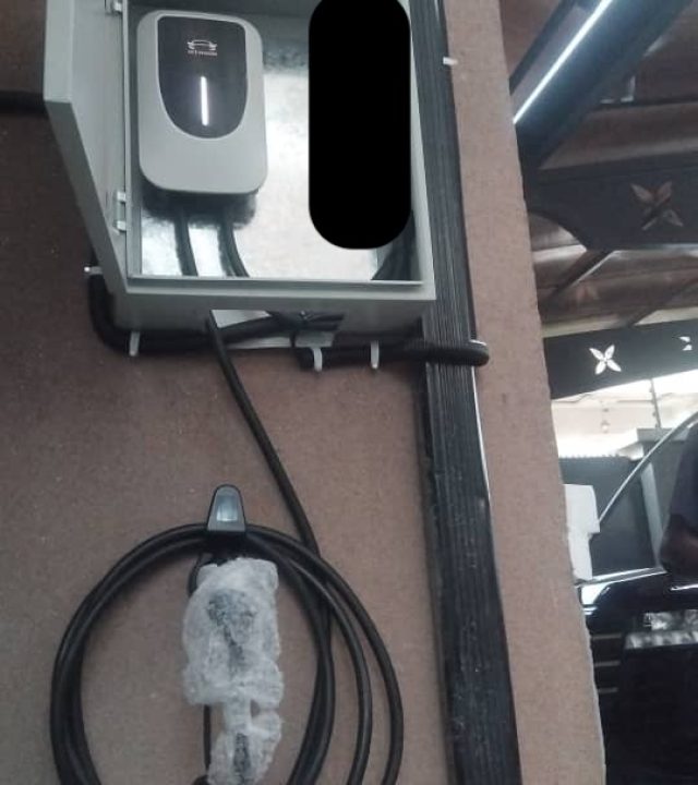 EV charger installed in a covered parking area in Abuja